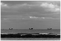 Fishing boats offshore. Jeju Island, South Korea (black and white)