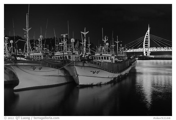 Fishing boats at night, Seogwipo. Jeju Island, South Korea (black and white)