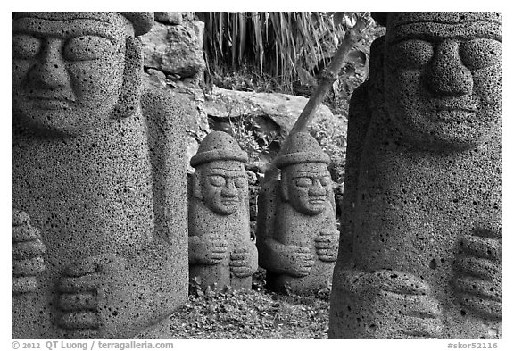 Dolharubang statues (grand father statues made of basalt rock), Seogwipo. Jeju Island, South Korea (black and white)