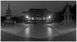 Frontal view of main hall and two pagodas at night, Bulguksa. Gyeongju, South Korea (Panoramic black and white)