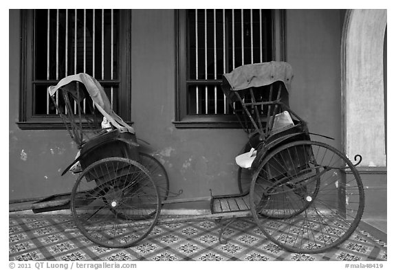 Bicycle rickshaws, Cheong Fatt Tze Mansion. George Town, Penang, Malaysia (black and white)