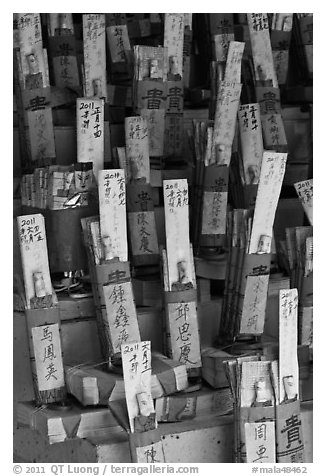 Sticks with names in Chinese characters, Kuan Yin Teng temple. George Town, Penang, Malaysia (black and white)