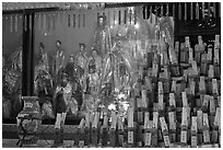 Statues and sticks, Kuan Yin Teng temple. George Town, Penang, Malaysia ( black and white)