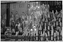 Statues and sticks, Kuan Yin Teng temple. George Town, Penang, Malaysia (black and white)