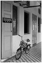 Bicycle in front of office. George Town, Penang, Malaysia ( black and white)