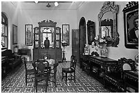 Room with furniture inside Pinang Peranakan Mansion. George Town, Penang, Malaysia (black and white)