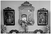 Portraits and mirors, Pinang Peranakan Mansion. George Town, Penang, Malaysia ( black and white)