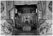 Carved stone dragons and main hall, Khoo Kongsi. George Town, Penang, Malaysia (black and white)