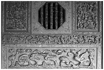 Octogonal window and stone carvings, Khoo Kongsi. George Town, Penang, Malaysia (black and white)