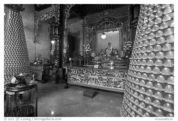 Wishing wheels and altar, Hainan Temple. George Town, Penang, Malaysia