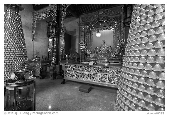 Wishing wheels and altar, Hainan Temple. George Town, Penang, Malaysia