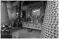 Wishing wheels and altar, Hainan Temple. George Town, Penang, Malaysia (black and white)