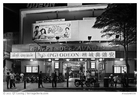 Movie theater showing Bollywood films at night. George Town, Penang, Malaysia