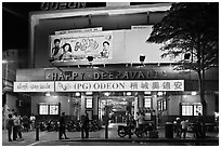 Movie theater showing Bollywood films at night. George Town, Penang, Malaysia ( black and white)