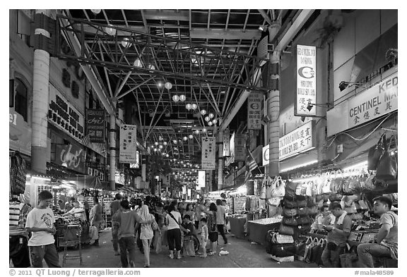 Jalan Petaling street market at night. Kuala Lumpur, Malaysia (black and white)