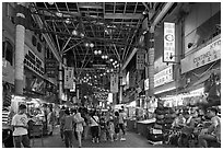 Jalan Petaling street market at night. Kuala Lumpur, Malaysia (black and white)