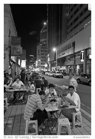Street restaurant at night, Chinatown. Kuala Lumpur, Malaysia (black and white)
