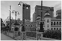 Street lamps and historic buildings at dawn, Merdeka Square. Kuala Lumpur, Malaysia ( black and white)