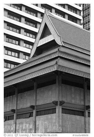 Tek house and modern buildings. Kuala Lumpur, Malaysia (black and white)