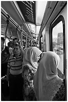 Inside Light Rail Transit (LRT) car. Kuala Lumpur, Malaysia (black and white)