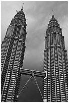 Petronas Towers (tallest twin towers in the world) and stormy sky. Kuala Lumpur, Malaysia (black and white)