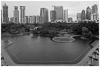 KLCC Park surrounded by high-rise towers. Kuala Lumpur, Malaysia ( black and white)