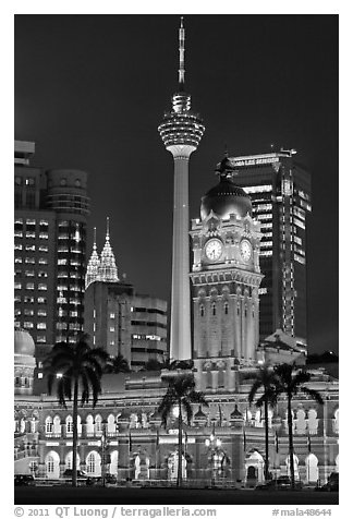 Sultan Abdul Samad Building, Petronas Towers, and Menara KL at night. Kuala Lumpur, Malaysia (black and white)