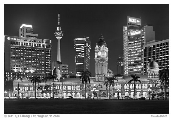 KL night skyline with Sultan Abdul Samad Building and Menara KL. Kuala Lumpur, Malaysia (black and white)