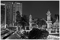 Masjid Jamek minarets and Sungai Klang river. Kuala Lumpur, Malaysia ( black and white)