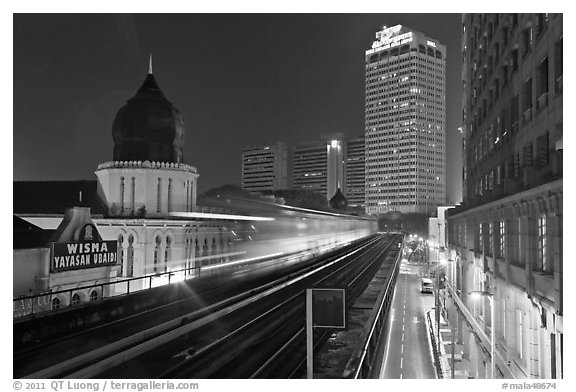 LRT train in motion at night. Kuala Lumpur, Malaysia