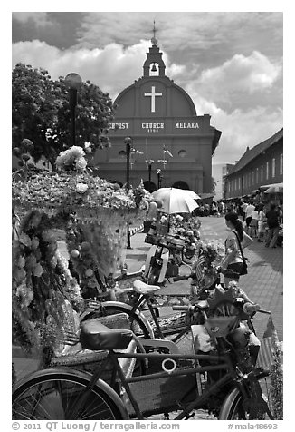 Malacca Town Square with trishaws and church. Malacca City, Malaysia