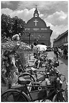 Malacca Town Square with trishaws and church. Malacca City, Malaysia (black and white)