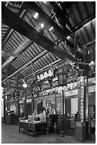 Altar of Guanyin (Goddess of Mercy) inside Cheng Hoon Teng temple. Malacca City, Malaysia ( black and white)