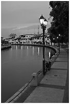 Melaka River river quay at dusk. Malacca City, Malaysia (black and white)