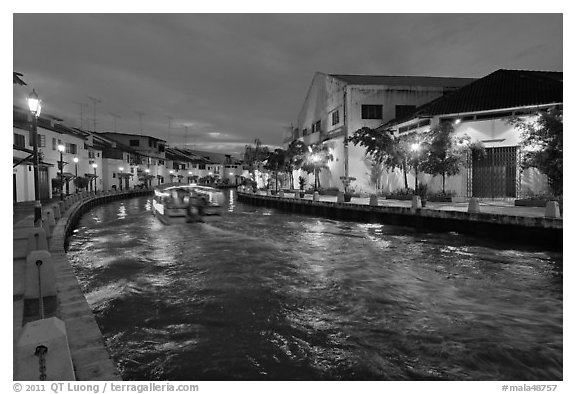 Melaka river with boat. Malacca City, Malaysia (black and white)