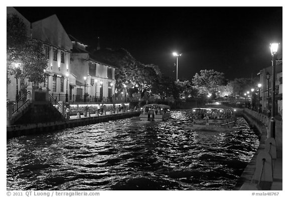 Tour boats on Melaka River at night. Malacca City, Malaysia (black and white)