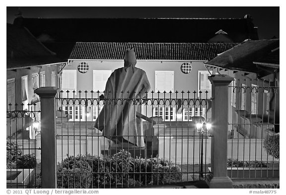 Statue and Stadthuys at night. Malacca City, Malaysia