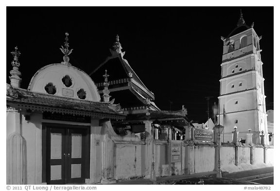 Gate, Mosque, and minaret, Masjid Kampung Hulu at night. Malacca City, Malaysia (black and white)