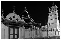 Gate, Mosque, and minaret, Masjid Kampung Hulu at night. Malacca City, Malaysia (black and white)