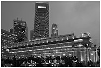 Fullerton Hotel and high rises at dusk. Singapore ( black and white)