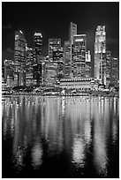 Fullerton Hotel and skyline at night. Singapore (black and white)