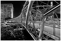 Double Helix Bridge in Marina Bay at night. Singapore (black and white)