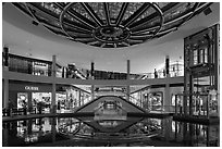 Pool and canal in the Shoppes, Marina Bay Sands. Singapore (black and white)