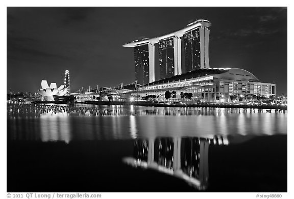 Marina Bay Sands resort and bay reflection at night. Singapore (black and white)