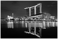 Marina Bay Sands resort and bay reflection at night. Singapore (black and white)