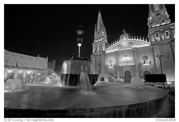 Plazza de los Laureles, fountain, and Cathedral by night. Guadalajara, Jalisco, Mexico (black and white)