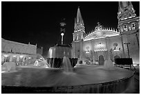 Plazza de los Laureles, fountain, and Cathedral by night. Guadalajara, Jalisco, Mexico (black and white)