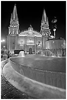 Fountain on Plazza de los Laureles and Cathedral by night. Guadalajara, Jalisco, Mexico (black and white)