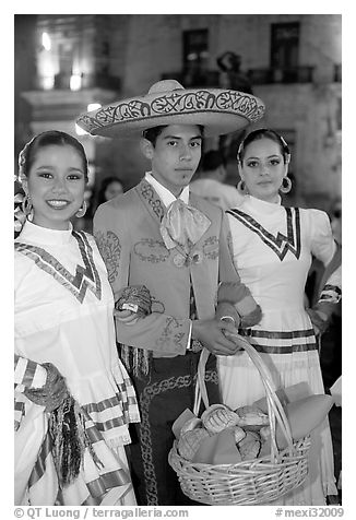 Man with sombrero hat surrounded by  two women. Guadalajara, Jalisco, Mexico