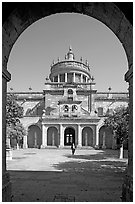 Entrance courtyard of Hospicios de Cabanas framed by an arch. Guadalajara, Jalisco, Mexico (black and white)